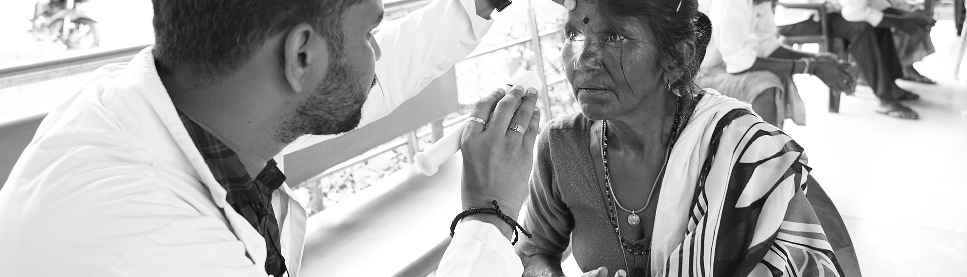 Doctor examining patient's eye